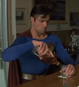 Superman Drinking GIF - Superman Drinking - Discover & Share GIFs